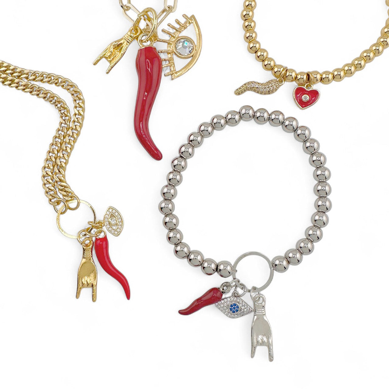 Italian horn jewelry bracelets and necklaces with red cornicello charms for protection and luck