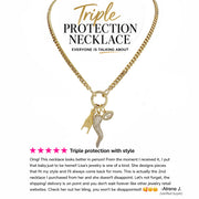 A gold-colored Italian horn (cornicello) necklace with multiple charms, including a hand and an evil eye, displayed against a white background.