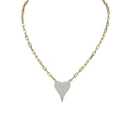 A gold-colored necklace with a paperclip chain and a heart-shaped pendant with silver crystals.