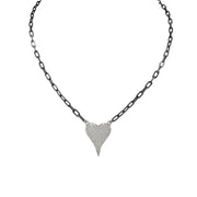A gunmetal-colored necklace with a paperclip chain and a heart-shaped pendant with silver crystals.