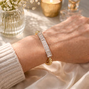 Alicia baguette beaded bracelet in gold on a model