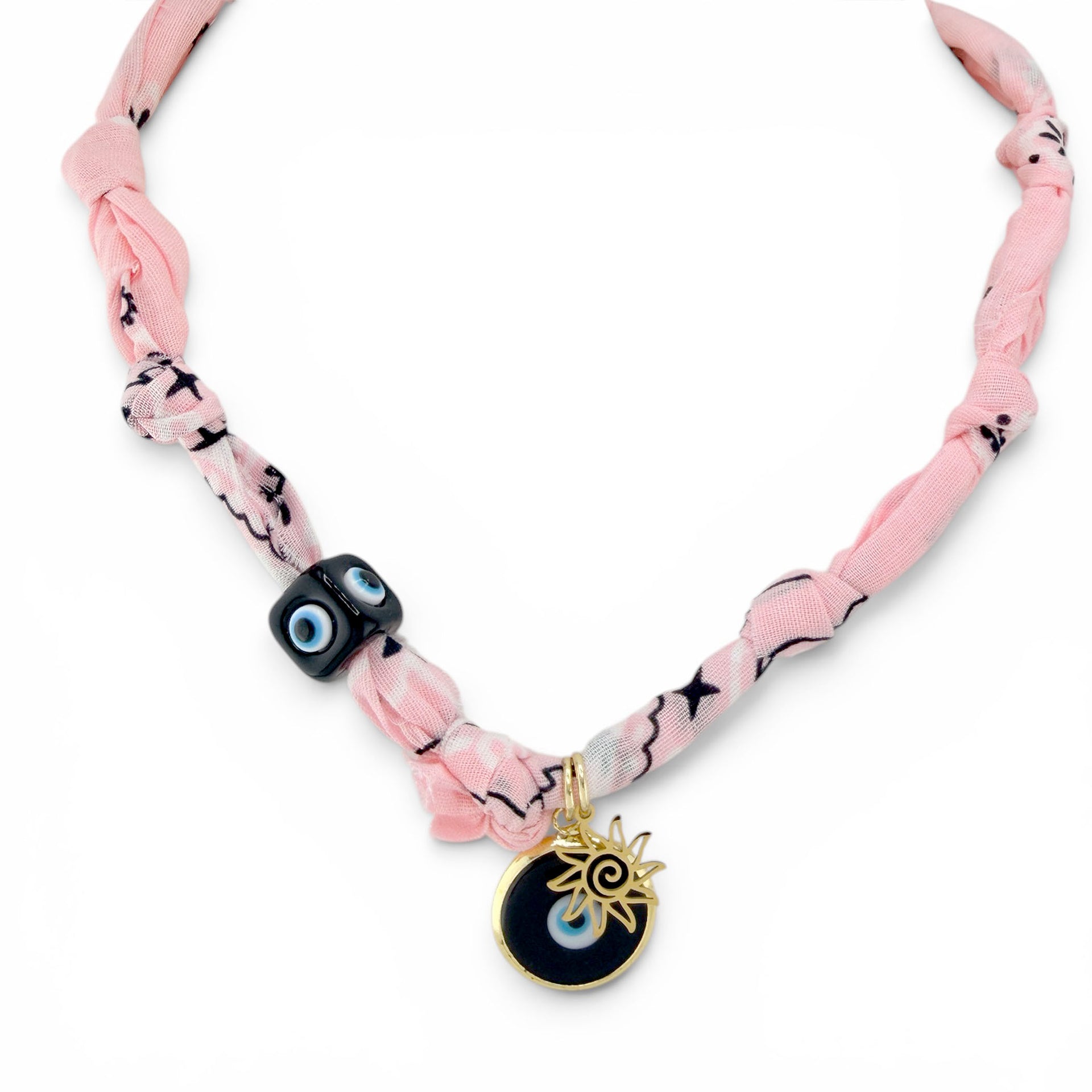 Santorini sun talisman bandana necklace with soft pink fabric evil eye beads and gold sun charm