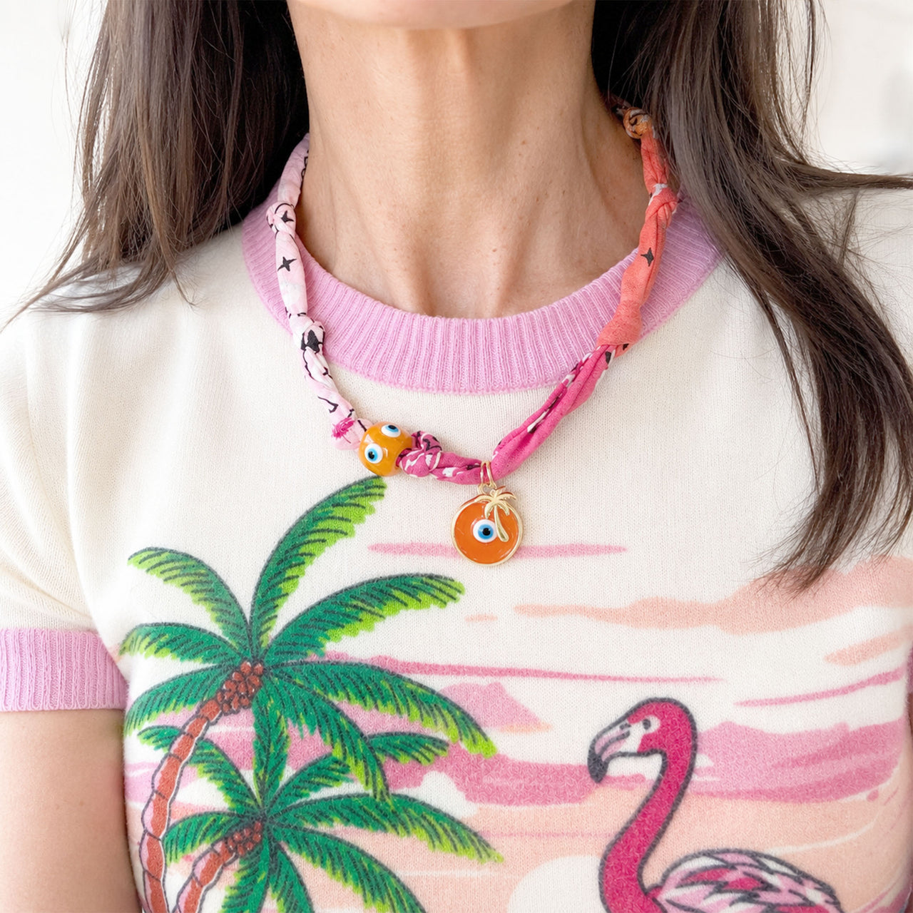 Love Lisa Amalfi talisman bandana necklace worn with colorful layered summer jewelry and resort styling