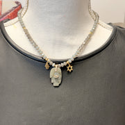 Love Lisa Amalia Gemstone Hamsa Protection Necklace worn at the neckline with a rondelle bead strand, large gemstone Hamsa pendant, petite Hamsa, and Star of David charm