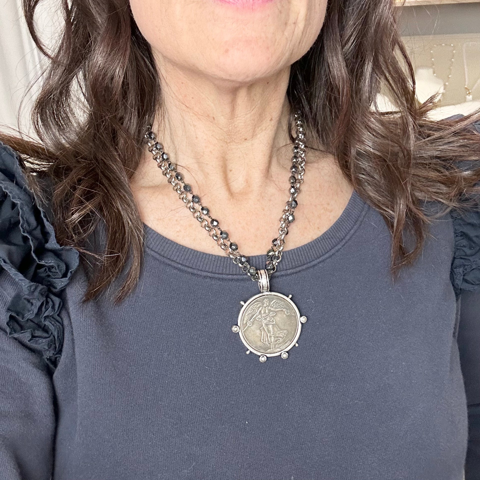 angelica french coin necklace with gold pendant worn on model layered love lisa jewelry