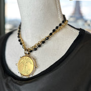 angelica french coin necklace styled on mannequin gold pendant with angel design and beaded chain love lisa