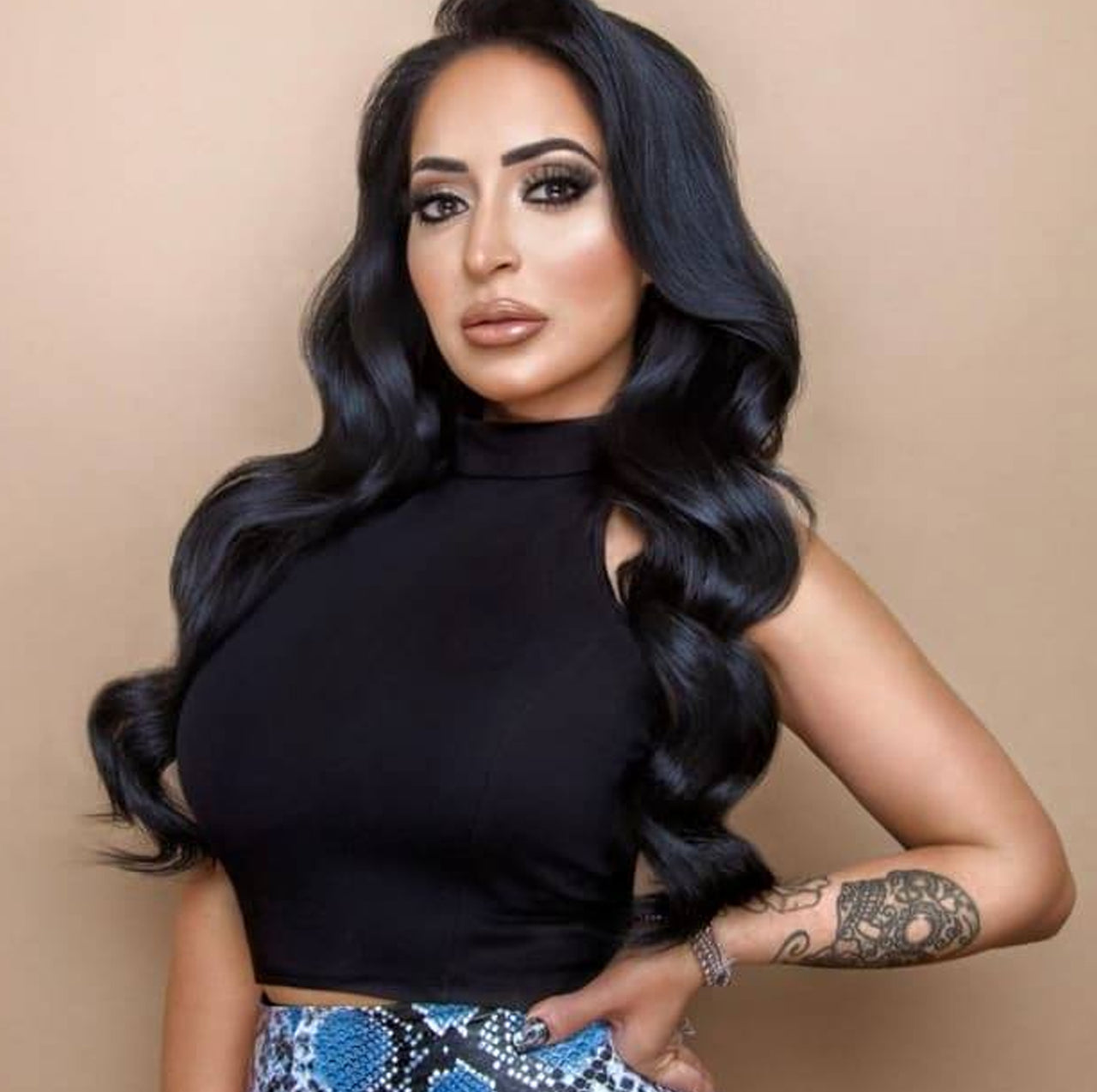 Angelina Pivarnick wearing the love lisa believe in the faith bracelets