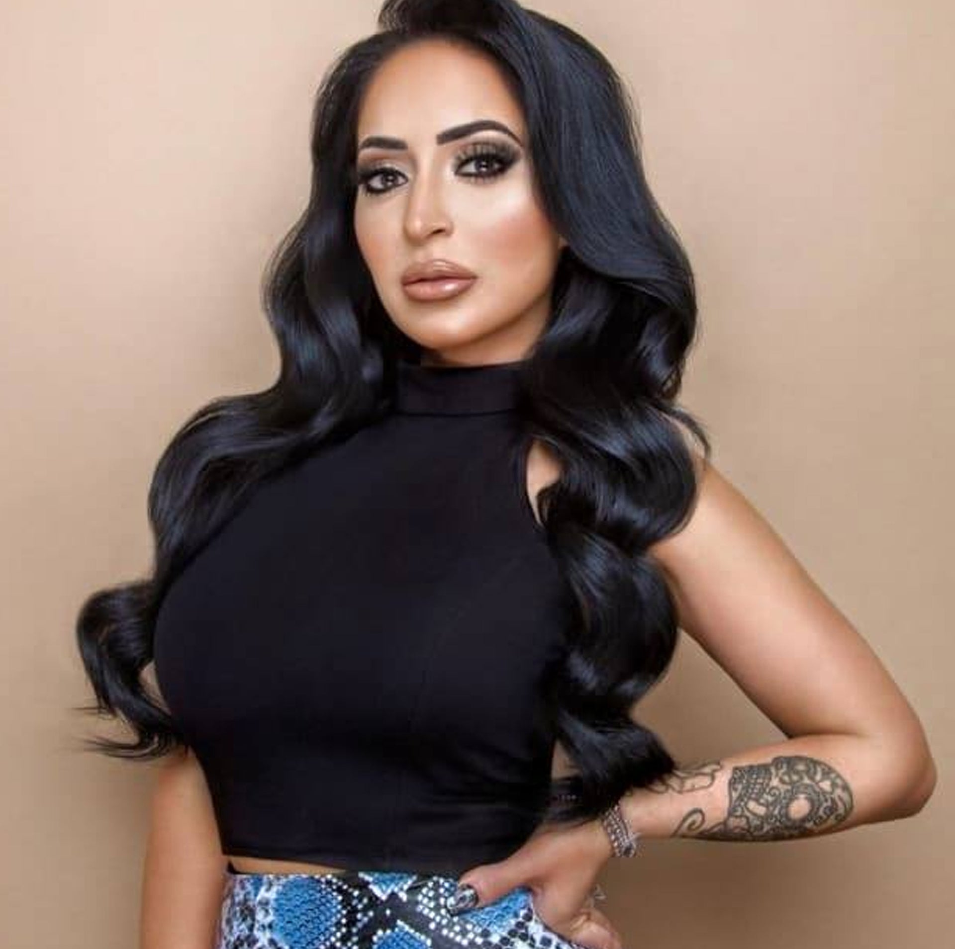 Angelina Pivarnick wearing the love lisa believe in the faith bracelets