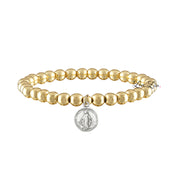 A collection of beaded bracelets with various metallic finishes and Saint medals.