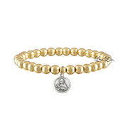 A collection of beaded bracelets with various metallic finishes and Saint medals.