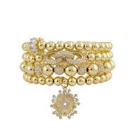 Love Lisa Aurora Star gold bracelet stack with pavé beads and star charm