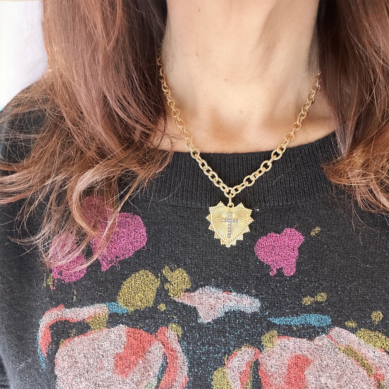 ava heart cross charm necklace shown on model gold ribbed chain with pave cross and heart pendant by love lisa