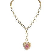 Love Lisa Layla Breast Cancer Awareness Pink Ribbon Necklace in gold with Y-link chain, spiked heart pendant, pink enamel ribbon charm, and magnetic clasp