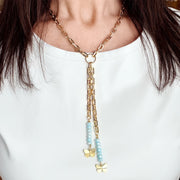 Love Lisa Bailey butterfly drop necklace worn showing long drop strands crystal beads and butterfly charm movement at neckline
