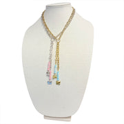 Love Lisa Bailey butterfly drop necklace display showing multiple color options with paperclip chain and cascading bead drops