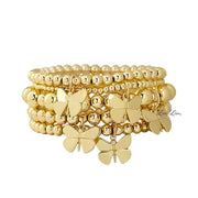 bailey butterfly stack of gold beaded bracelets with silver butterfly charms by love lisa