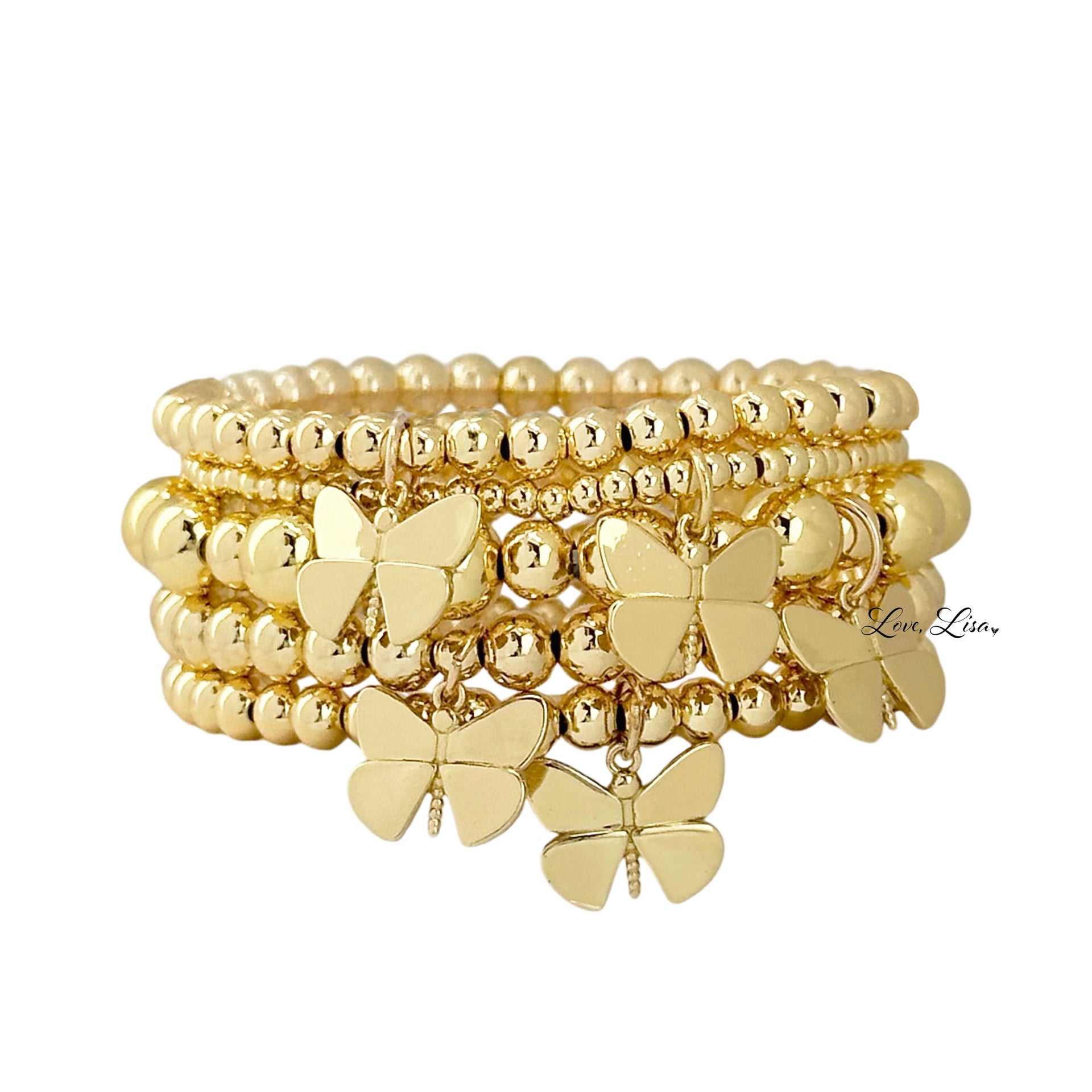 bailey butterfly stack of gold beaded bracelets with silver butterfly charms by love lisa