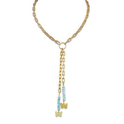 Bailey butterfly drop necklace aqua turquoise with layered bead drop strands butterfly charms and gold chain detail
