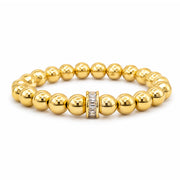 Bellissima Crystal Beaded Bracelet in Gold with tone accents, and crystal centerpiece