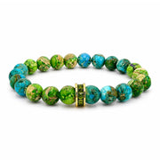 Bellissima Crystal Rondelle Gemstone Bracelet in Olive with Sea Sediment Jasper beads, gold-tone accents, and crystal centerpiece