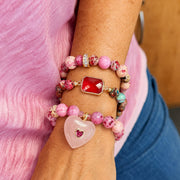 Love Lisa Bellissima Emerald Cut Crystal Gemstone Bracelet worn in a bracelet stack with gemstone beads, gold-tone accents, and crystal centerpiece