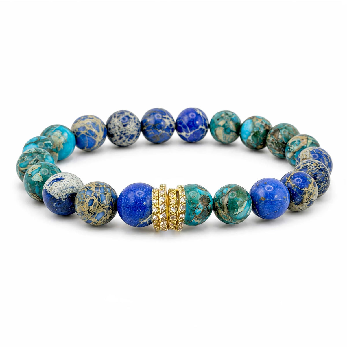 A beaded stretch bracelet featuring round blue and green marbled beads with natural gold veining, accented by a central gold-toned ring with small clear stones, shown on a plain white background.
