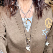 model wearing bianca howlite horn pendant necklace with white stone horn and crystal pave cap by Love Lisa jewelry