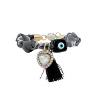 
Black and gray bandana bracelet with black evil eye bead iridescent heart charm and black tassel

