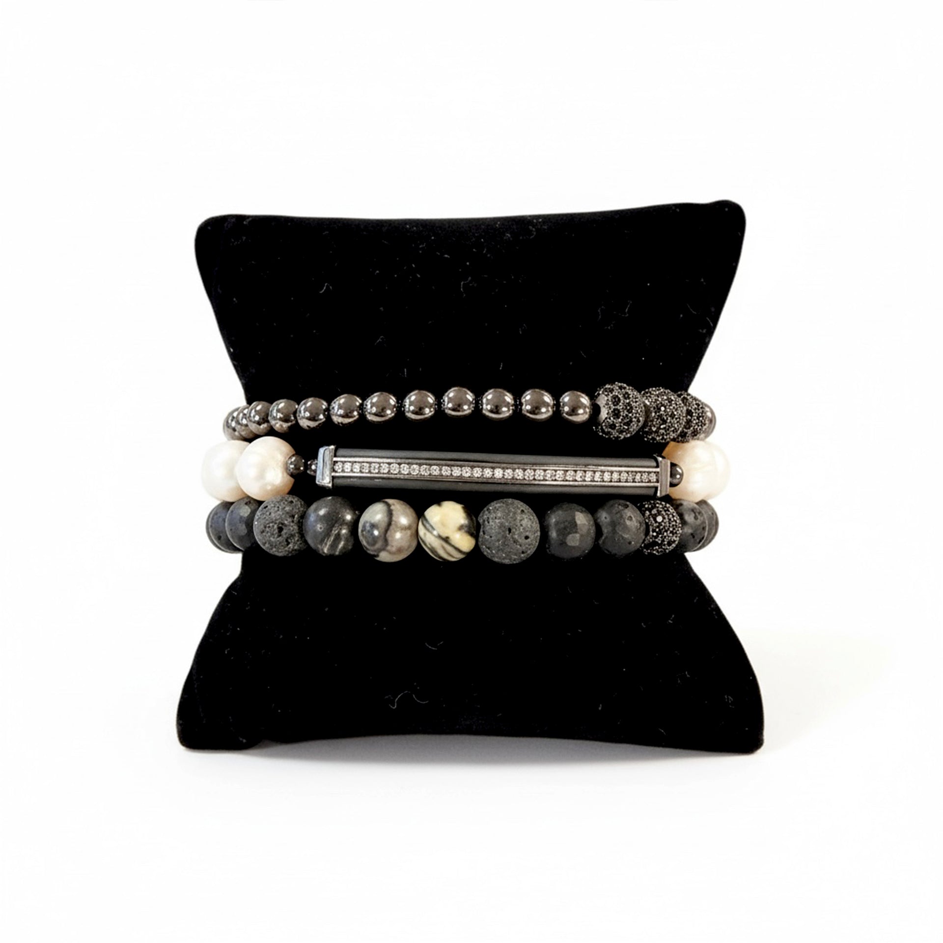 Love Lisa mens bracelet stack black onyx and pearl beaded design on pillow