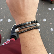 Love Lisa black onyx and pearl mens bracelets worn on wrist