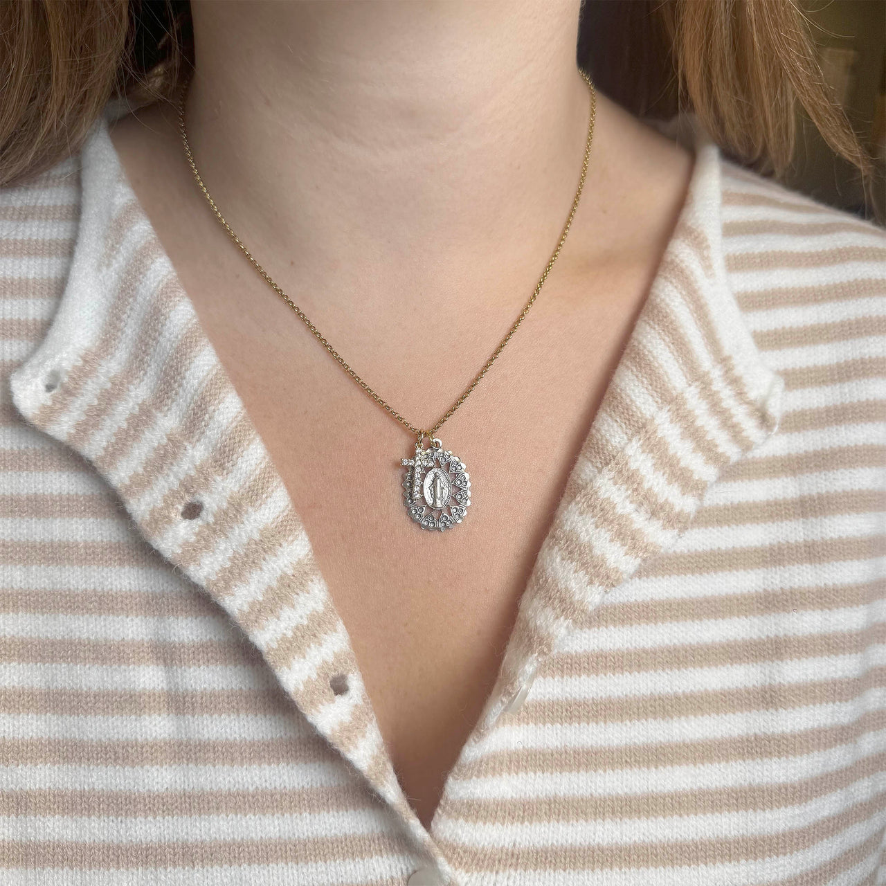 Blessed Mother and Cross Necklace displayed on chain for a classic religious jewelry look