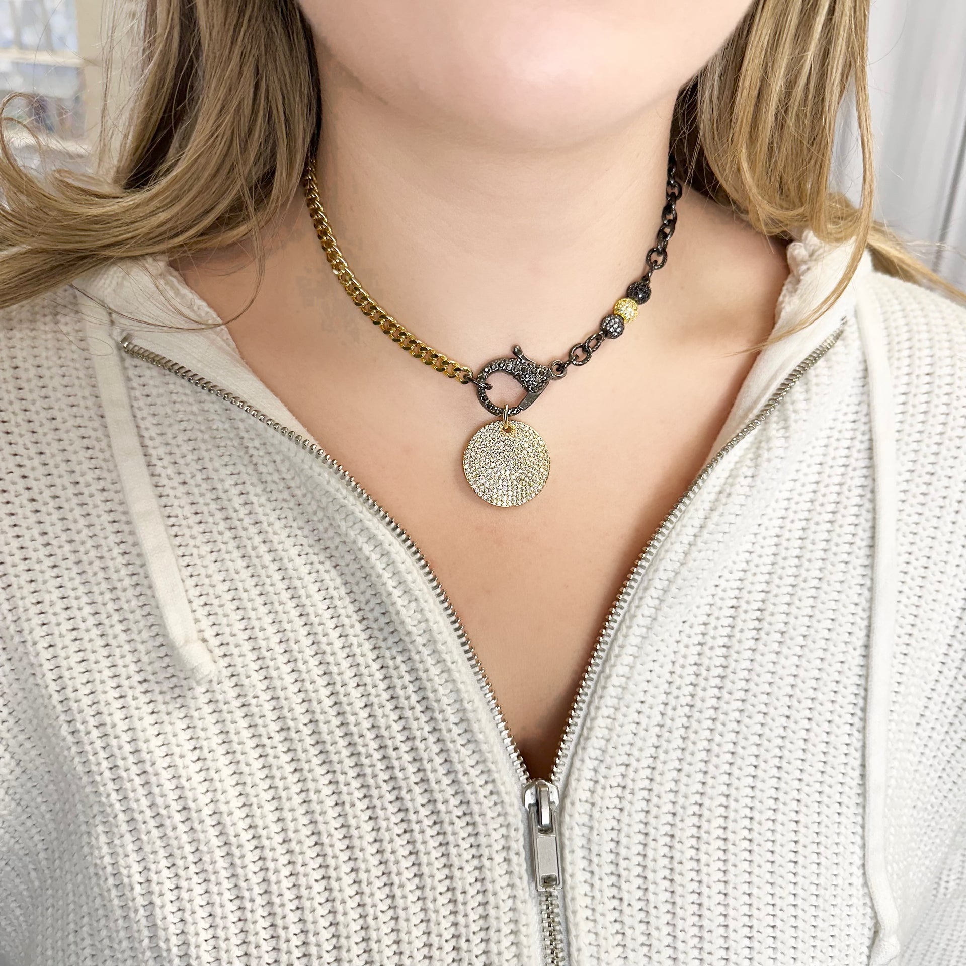 Model wearing gold pavé Bling Bling Disc Charm on mixed metal chain

