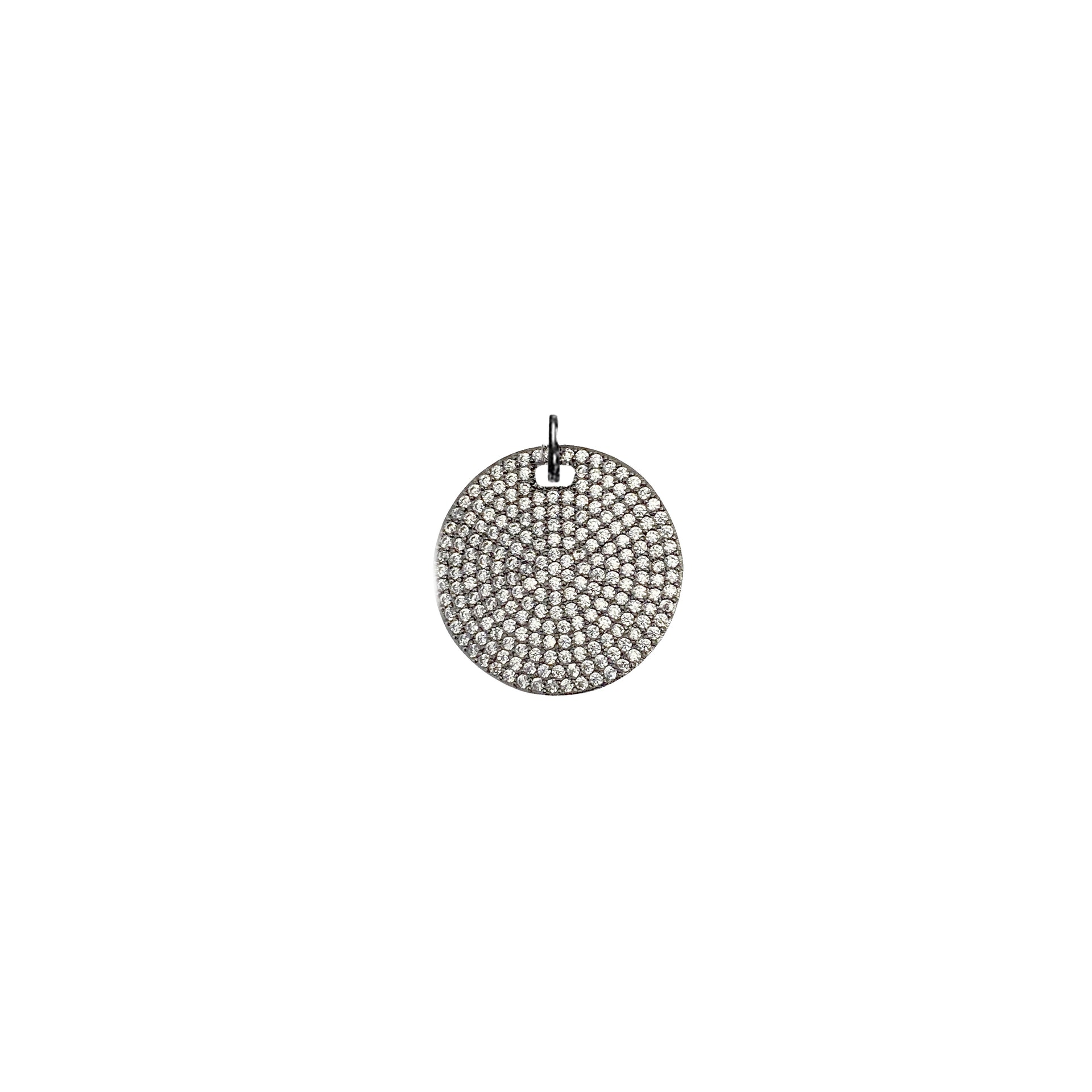 Gunmetal round disc charm covered in pavé crystals

