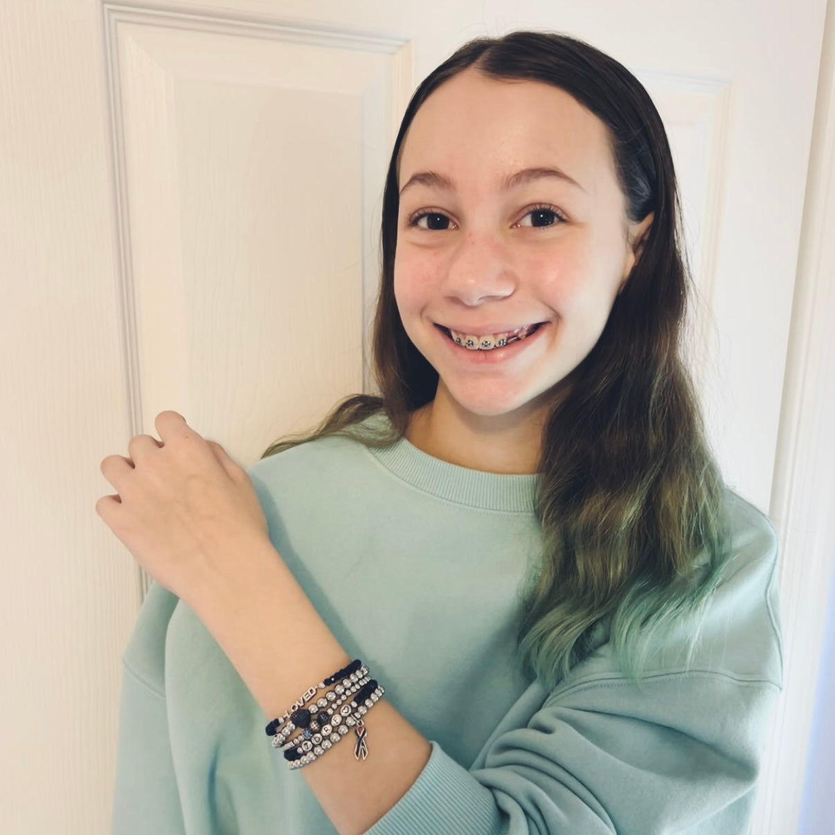 Hannah wearing Blue Ribbon T1D Awareness Bracelet by Love Lisa supporting Breakthrough T1D charity