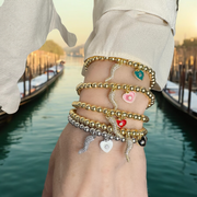 love lisa brandi heart horn bracelets stacked on wrist