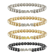 Love Lisa Samantha Breast Cancer Awareness BRAVE Bracelets displayed in Gold, Gold/Silver, Silver, and Gunmetal finishes with polished metal beads