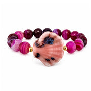 Calista Ceramic Shell Gemstone Bracelet in Berry Blush with magenta faceted gemstone beads and glazed ceramic shell centerpiece