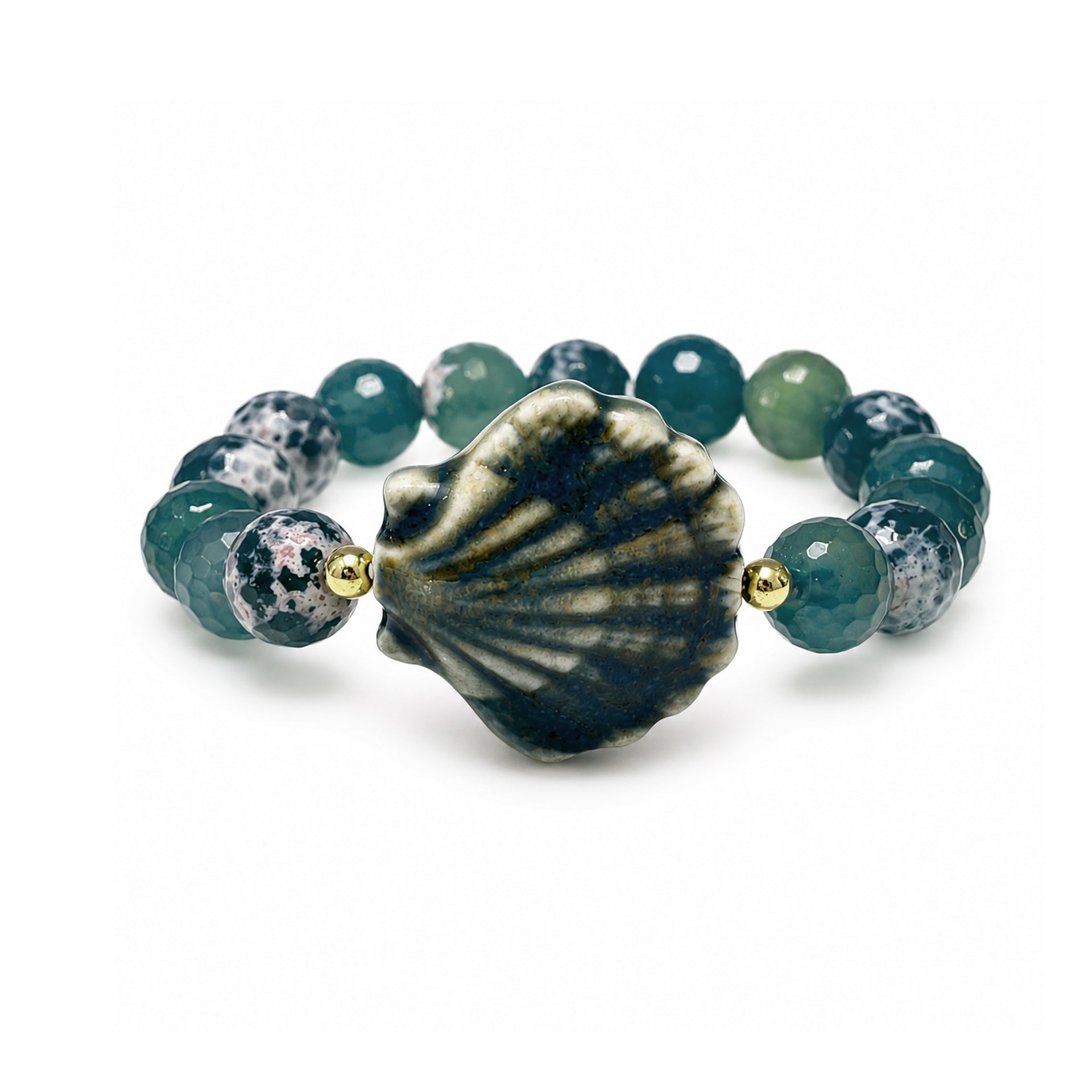 Calista Ceramic Shell Gemstone Bracelet in Ocean Mist with deep green blue faceted gemstone beads and glazed ceramic shell centerpiece