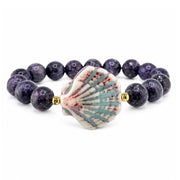 Calista Ceramic Shell Gemstone Bracelet in Purple Reef with purple faceted gemstone beads and glazed ceramic shell centerpiece