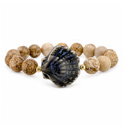 Calista Ceramic Shell Gemstone Bracelet in Sand Dune with neutral tan faceted gemstone beads and glazed ceramic shell centerpiece