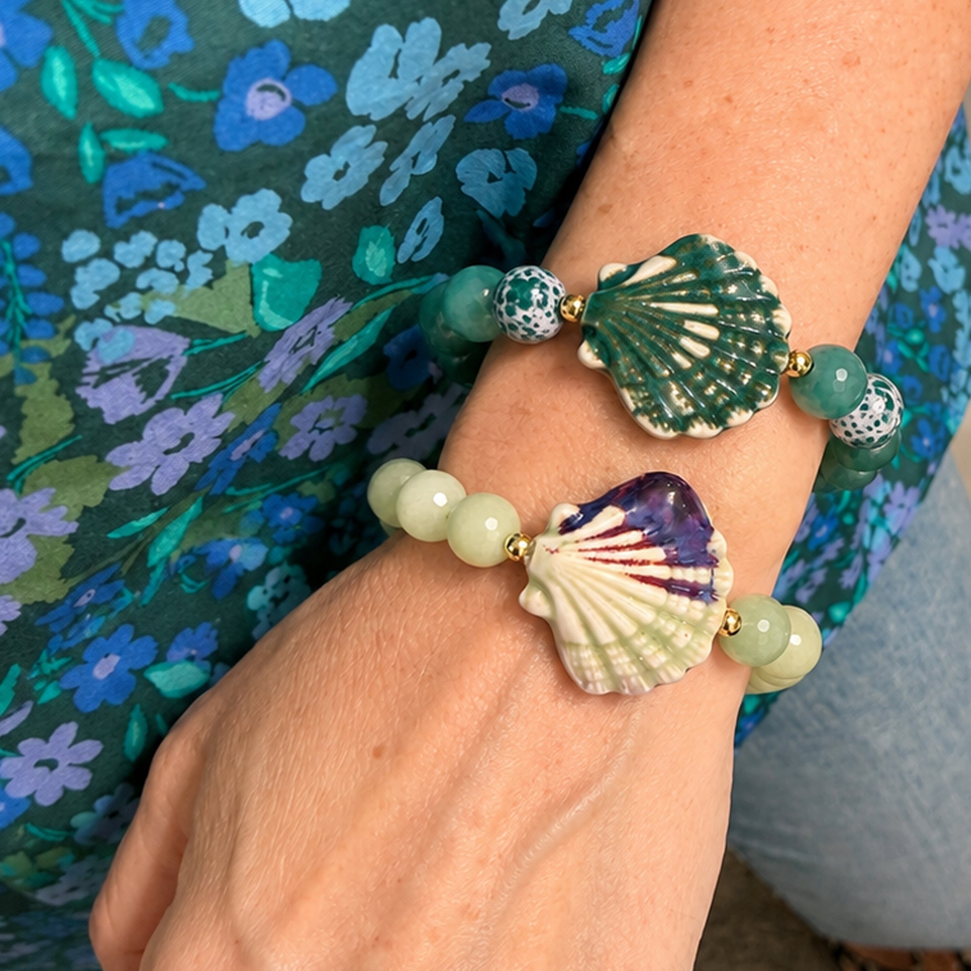 Love Lisa Calista Ceramic Shell Gemstone Bracelet worn in a coastal bracelet stack with shell charm and gemstone beads