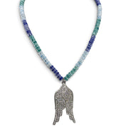 Celeste Angel Wing Ceramic Beaded Necklace in Coastal Sky with blue green ceramic rondelle beads and oversized silver crystal angel wing pendant