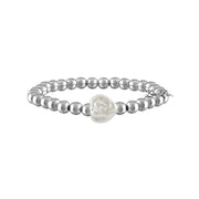 Handmade stretch bracelet with sculpted pearl heart and metallic beads in gold and hematite