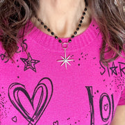  Black and silver beaded necklace with north star charm