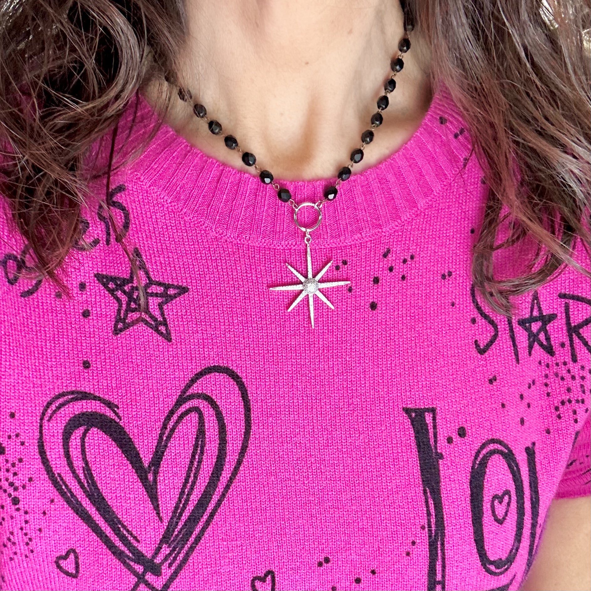  Black and silver beaded necklace with north star charm