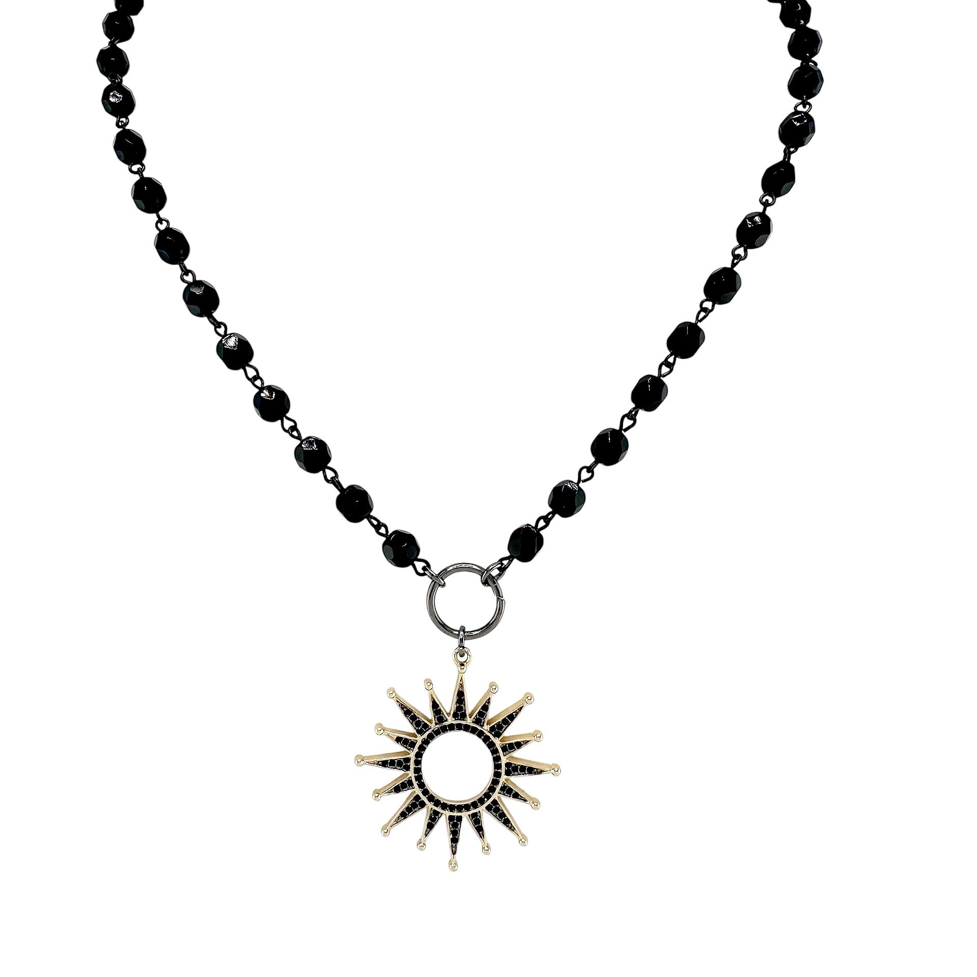Flat lay of gold sun beaded necklace