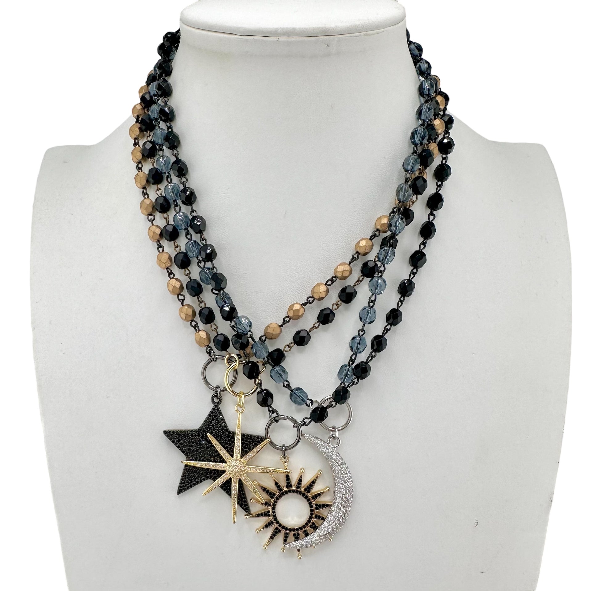 Sun necklace displayed on jewelry bust