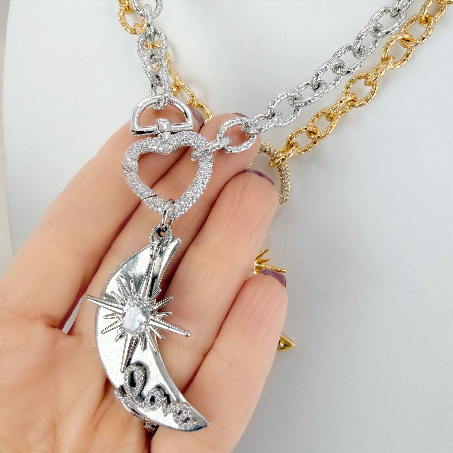 Crescent moon love charm with north star and crystal heart clasp necklace detail