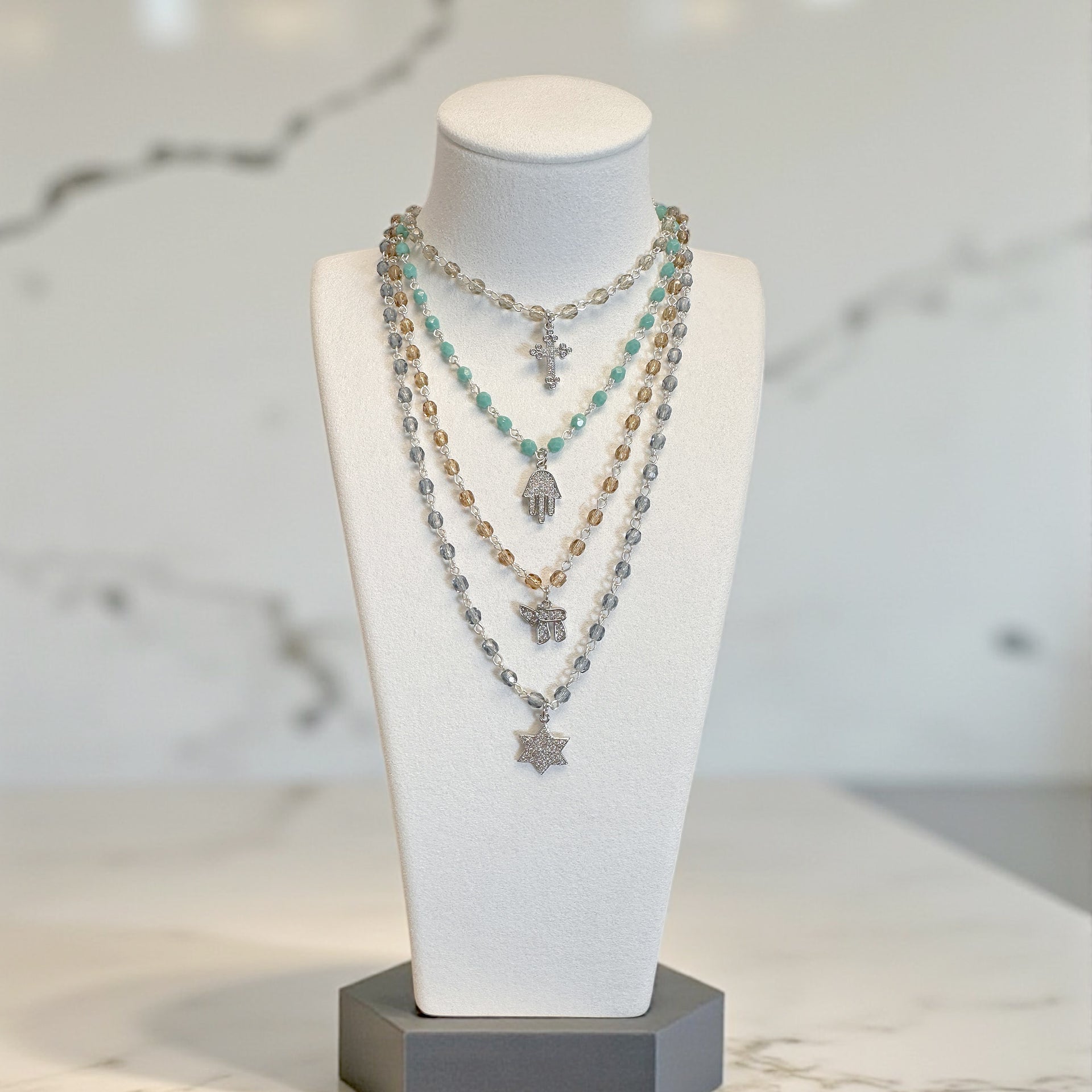 Design Your Own Beaded Religious Charm Necklace by Love Lisa layered necklace display