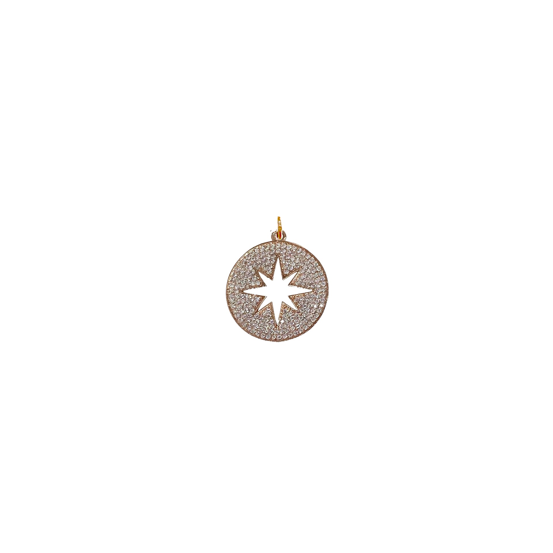 Rose gold star charm with cutout center and shimmering stone